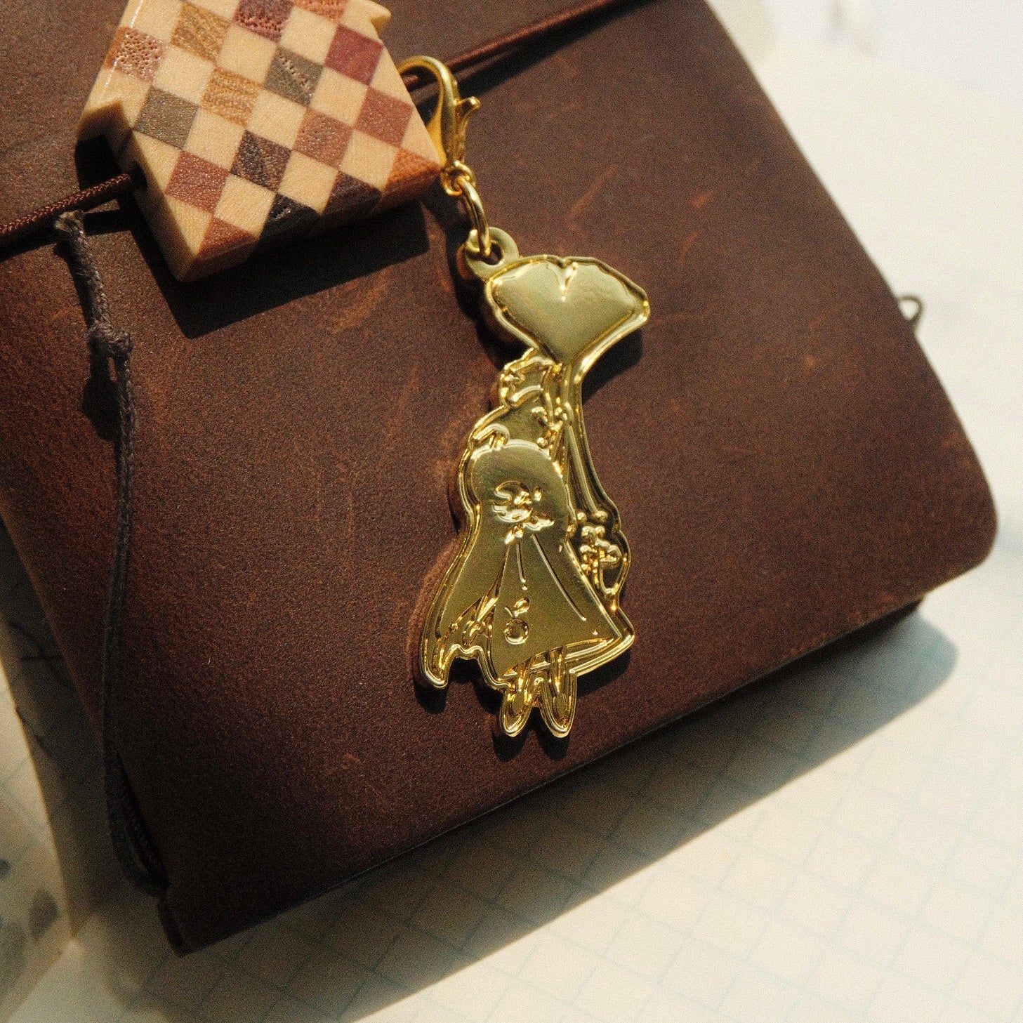Brass Charm - Floating