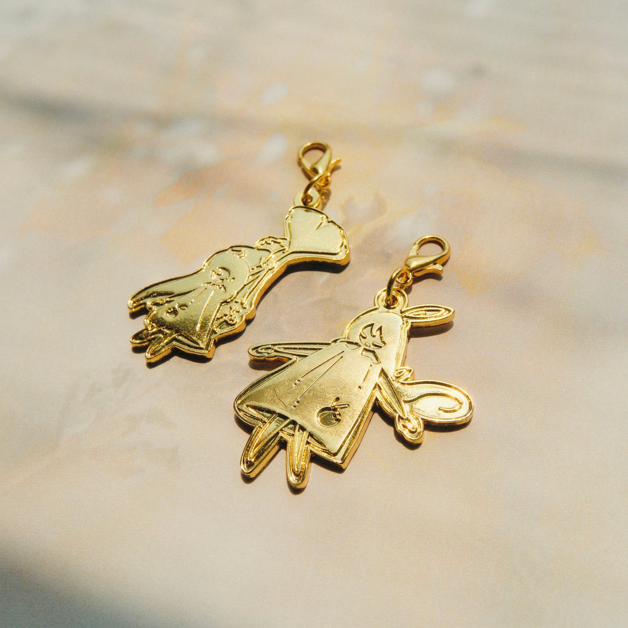 Brass Charm - Laying