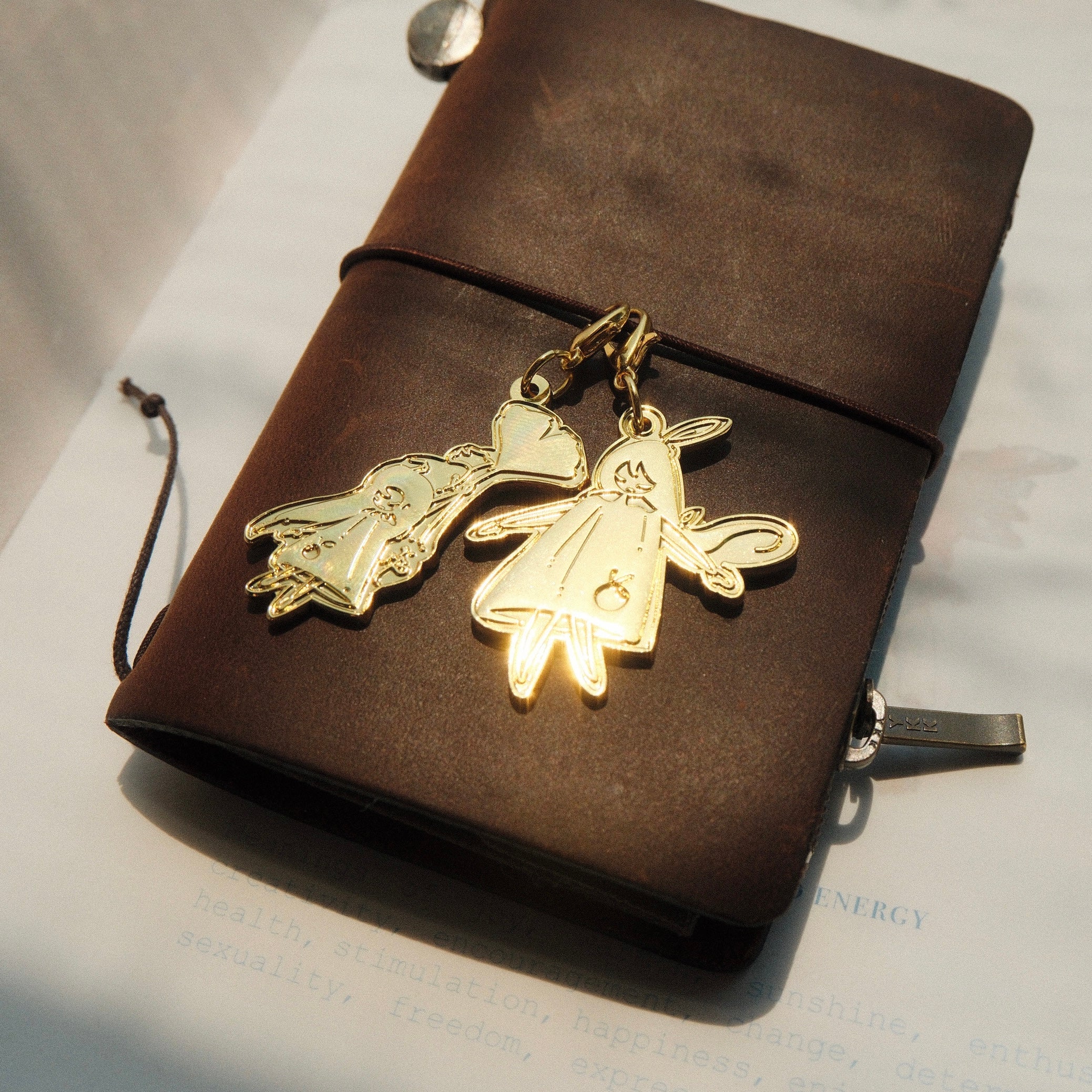 Brass Charm - Laying